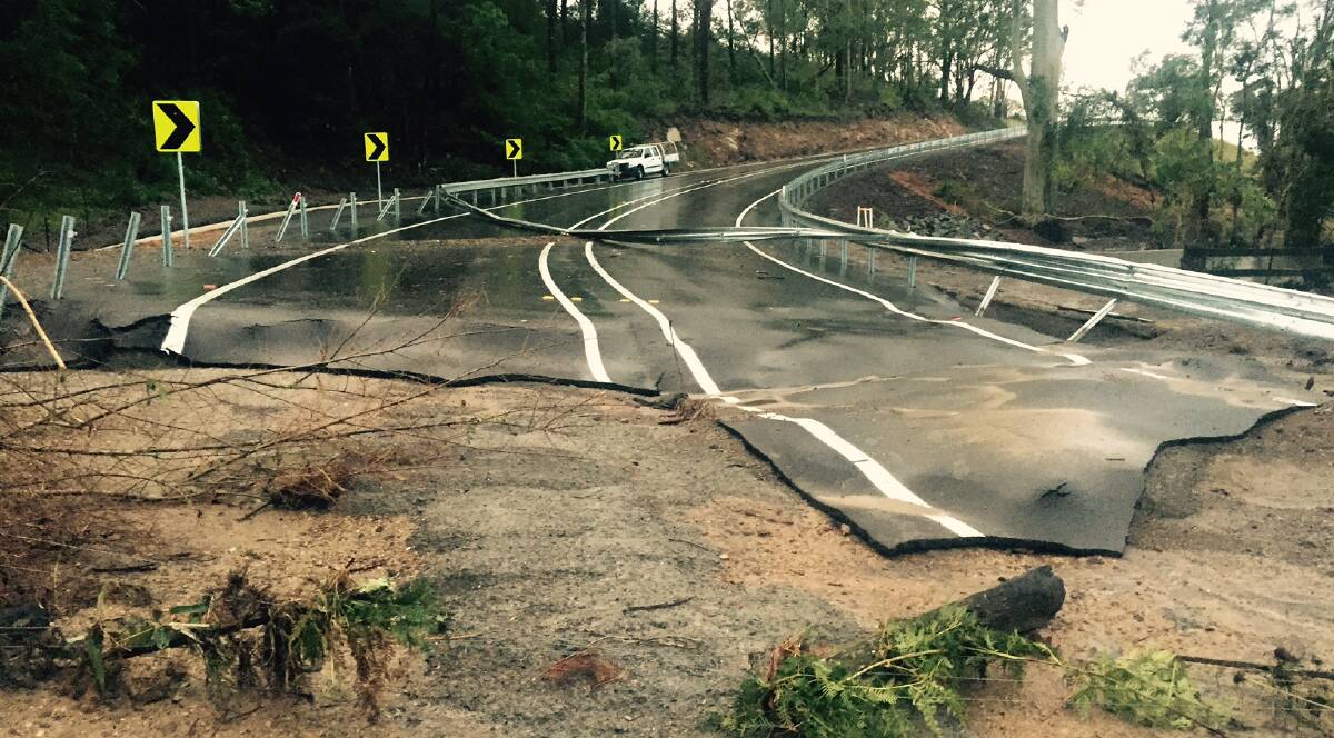 LOOKING BACK: Clarence Town Road near Seaham was extensively damaged. Initial estimates placed the storm damage at $11 million. Picture: Jemma Maytom