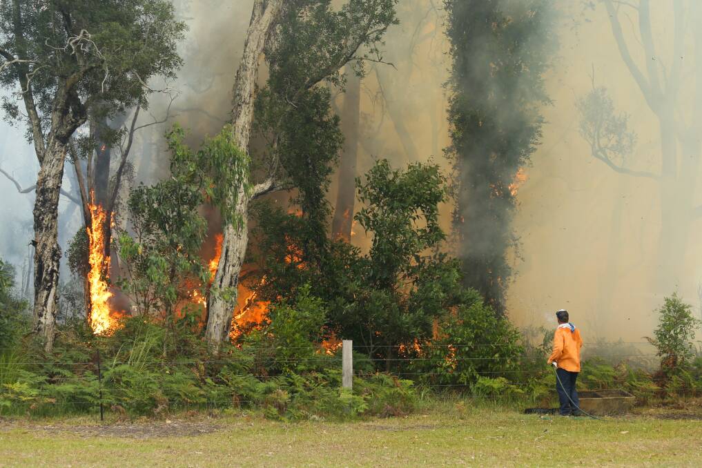 BUFFER: Fire fighters have commended property owners along Cabbage Tree Road. on their asset protection zones which aided their efforts. Picture: Johnathan Carroll