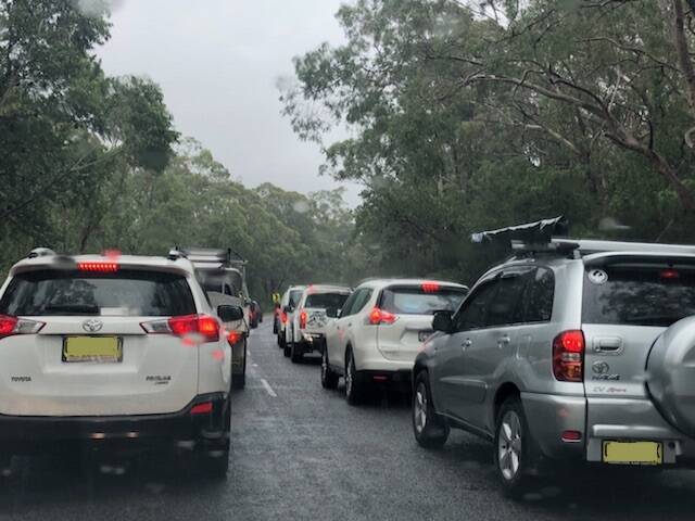 SNAIL PACE: The scene on Nelson Bay Road at the end of the June long weekend. The state government has pledged a further $8.3 million for roundabout projects.