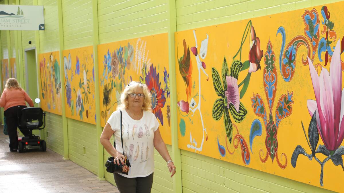 IMPRESSED: Jean Keeley, Karuah, enjoyed the arcade mural on her weekly shop. "It really brightens the whole area. It's really refreshing," she said. Picture: Sam Norris