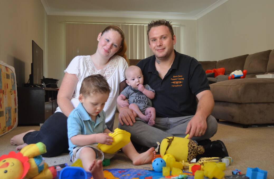 LITTLE FIGHTER: Four-month-old Joshua Taylor has become the centre of attention for Taylah Buddle and William Taylor, for all the wrong reasons. Even Connor, 2, helps out.