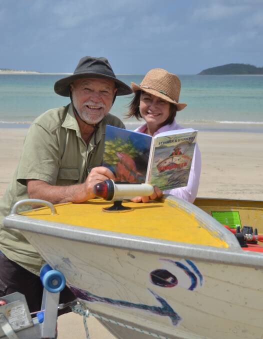 BUOYANT: John "Stinker" Clarke and artist Ileana Clarke have produced a children's book, Unwanted, about the fishing columnist's little boat that could. Picture: Sam Norris