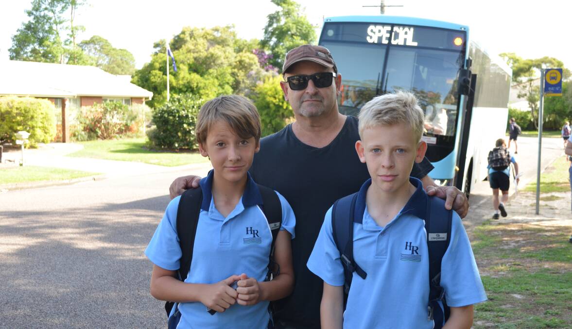 AT RISK: Lemon Tree Passage father Stephen Kirk, pictured with sons Sam and Jack, wants to see an end to children standing on school buses. Picture: Sam Norris