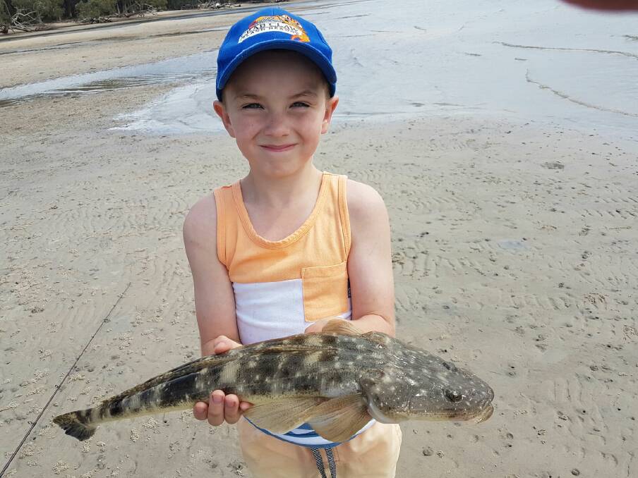 FAMILY TRADITION: Eight-year-old Rylan Coles knows all the flathead secrets.
