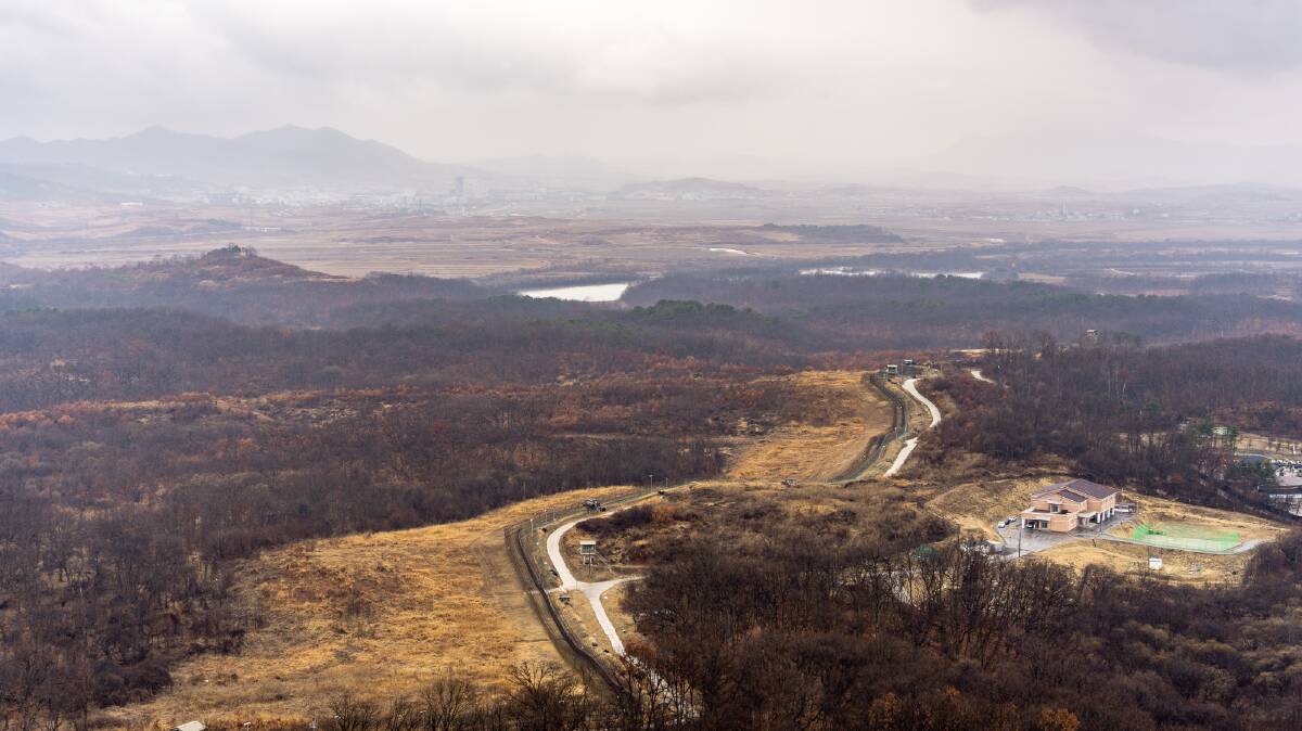 The southern boundary of the DMZ, with the demilitarised zone to the left. Picture by Michael Turtle