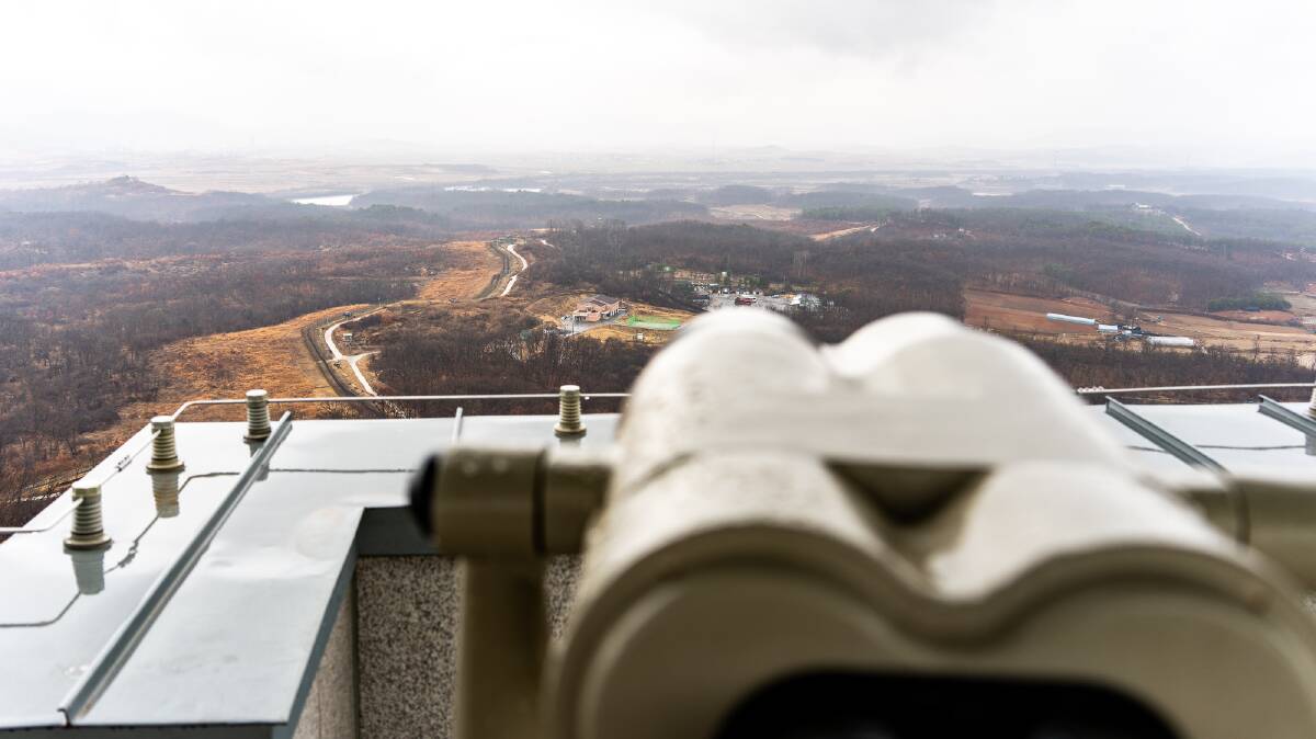 Looking out across the DMZ from the Dora Observatory. Picture by Michael Turtle