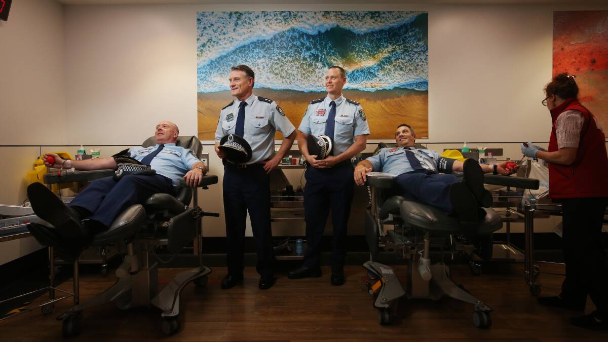 Assistant Commissioner Peter McKenna, Detective Superintendent David Waddell, Detective Inspector Matthew Crotty and Inspector Mitchell Dubojski donate blood at Lifeblood Newcastle. Picture by Simone de Peak