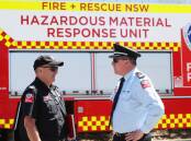 Newcastle Fire and Rescue NSW Superintendent Brian Smart with Acting Commissioner Jeremy Fewtrell at the scene at MGA Thermal in Tomago on Friday. Picture by Peter Lorimer