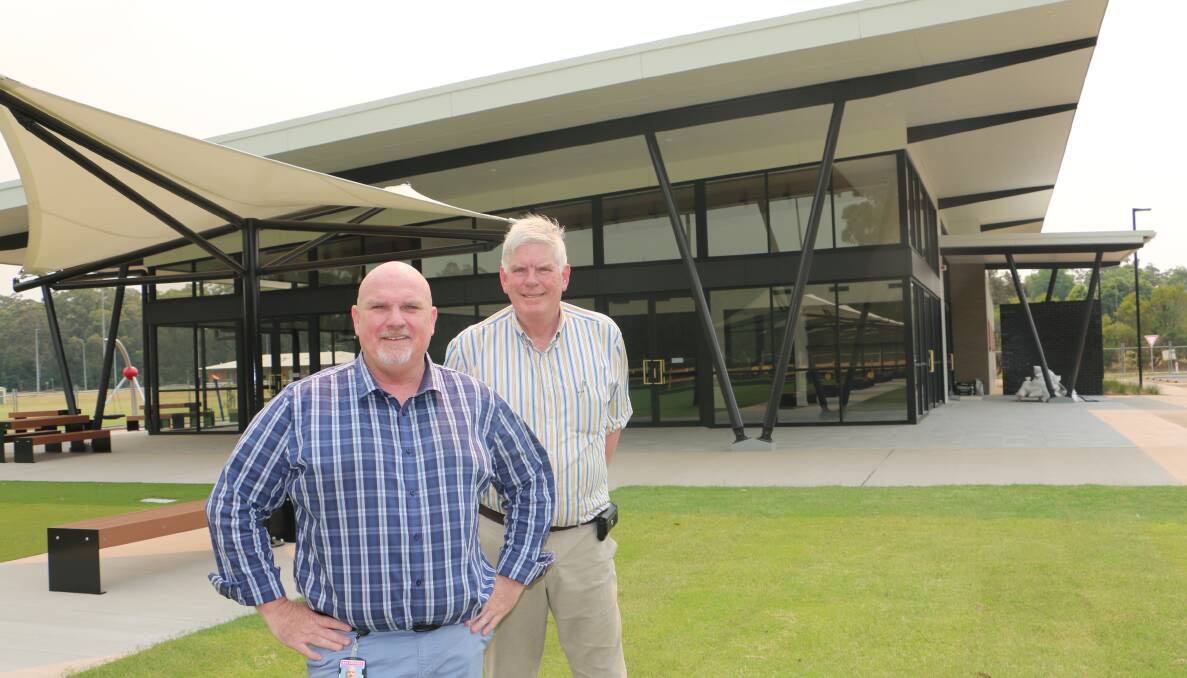 NEW ASSET: Port Stephens central ward Chris Doohan with Medowie Sports and Community Club president Craig Baumann in front of the $6.5 million facility.