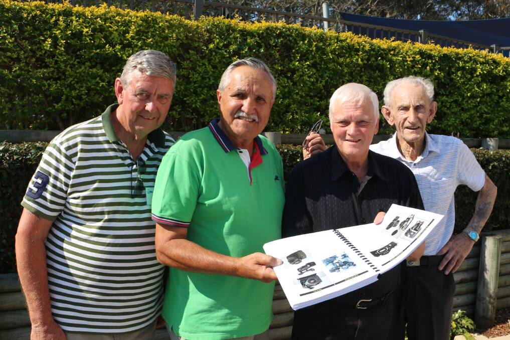 COLLABORATION: Former RAN photographers with a draft copy of the historic publication Doug Pryke, Medowie's George Anderson, Charles Lammers and Bob Maughan at One Mile caravan park.