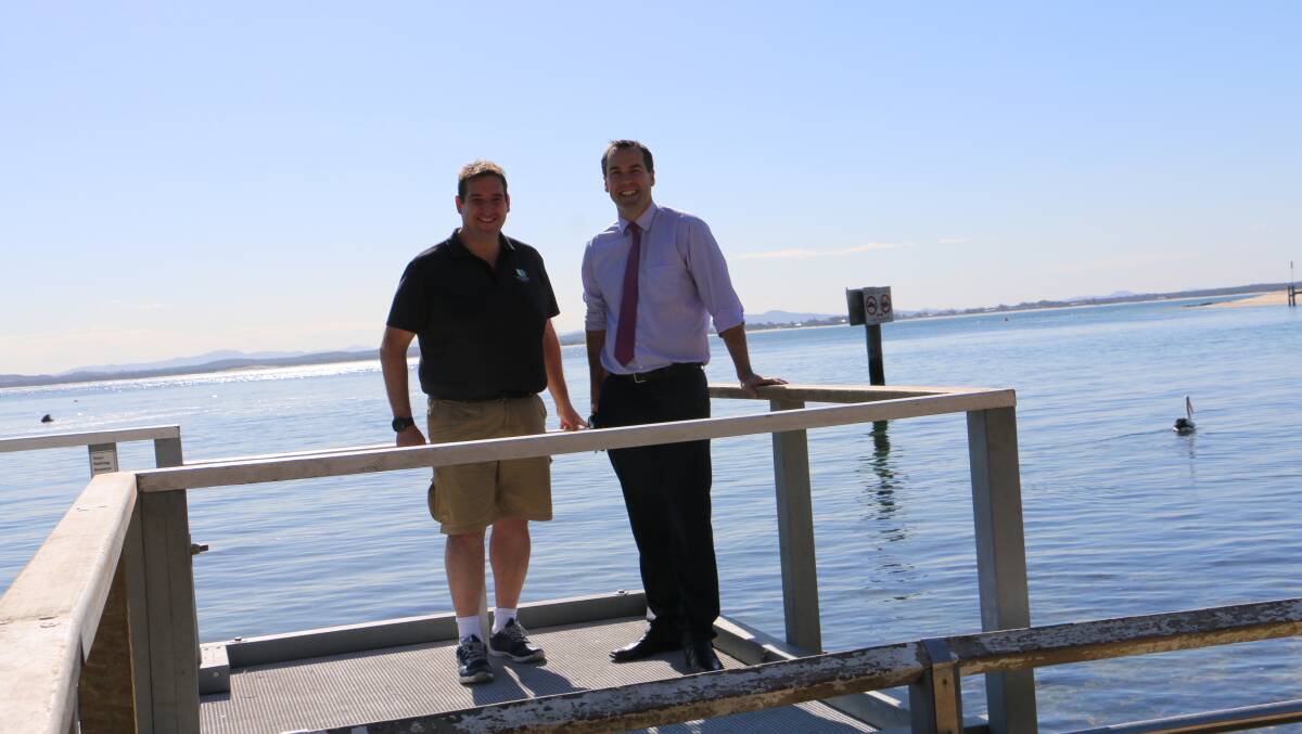 Councillors Glen Dunkley and Ryan Palmer inspect the work being carried out on the existing Little Beach access ramp.