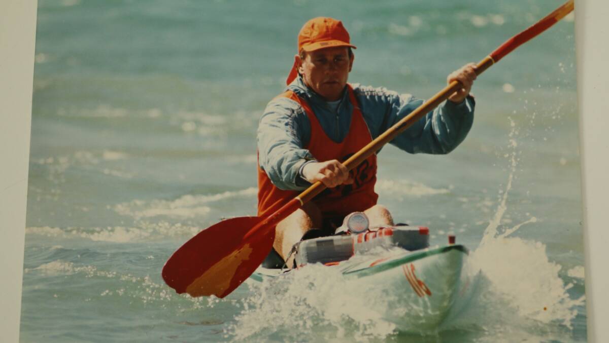 FROM THE FAMILY ALBUM: Fingal Bay's Eddy Bergsma in training on his surf ski at his home beach. Picture: Supplied