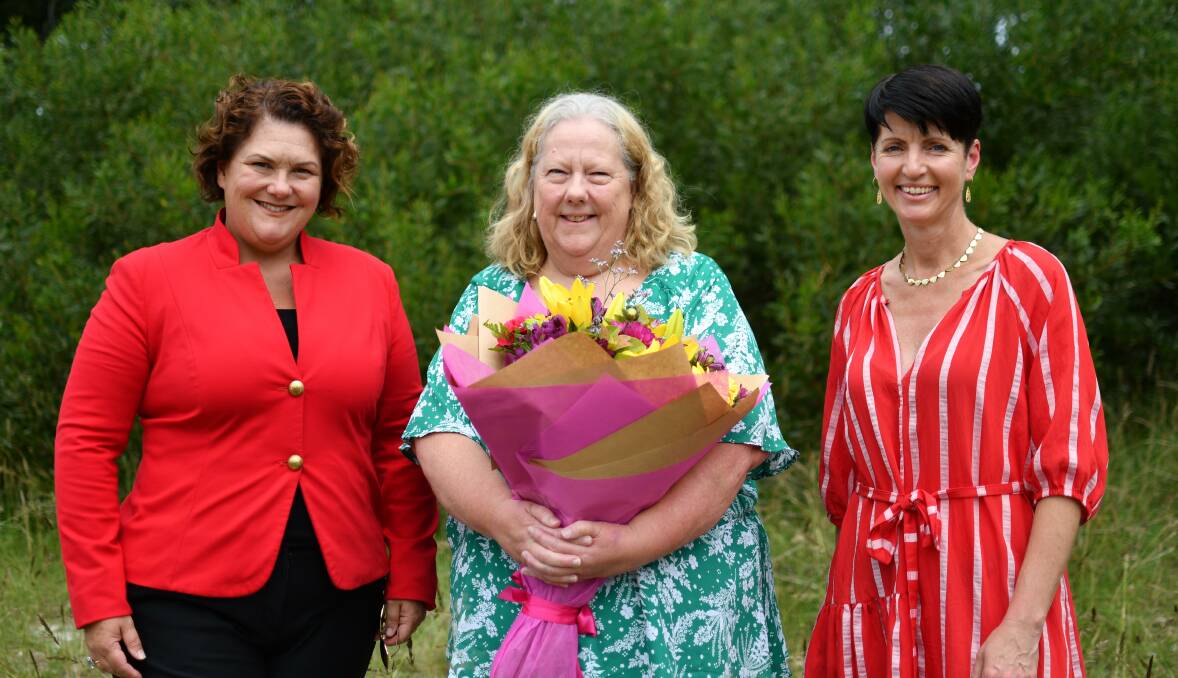 WELL DESERVED: Woman of the Year for 2021 Sue Pollock flanked by MPs Meryl Swanson (left) and Kate Washington.