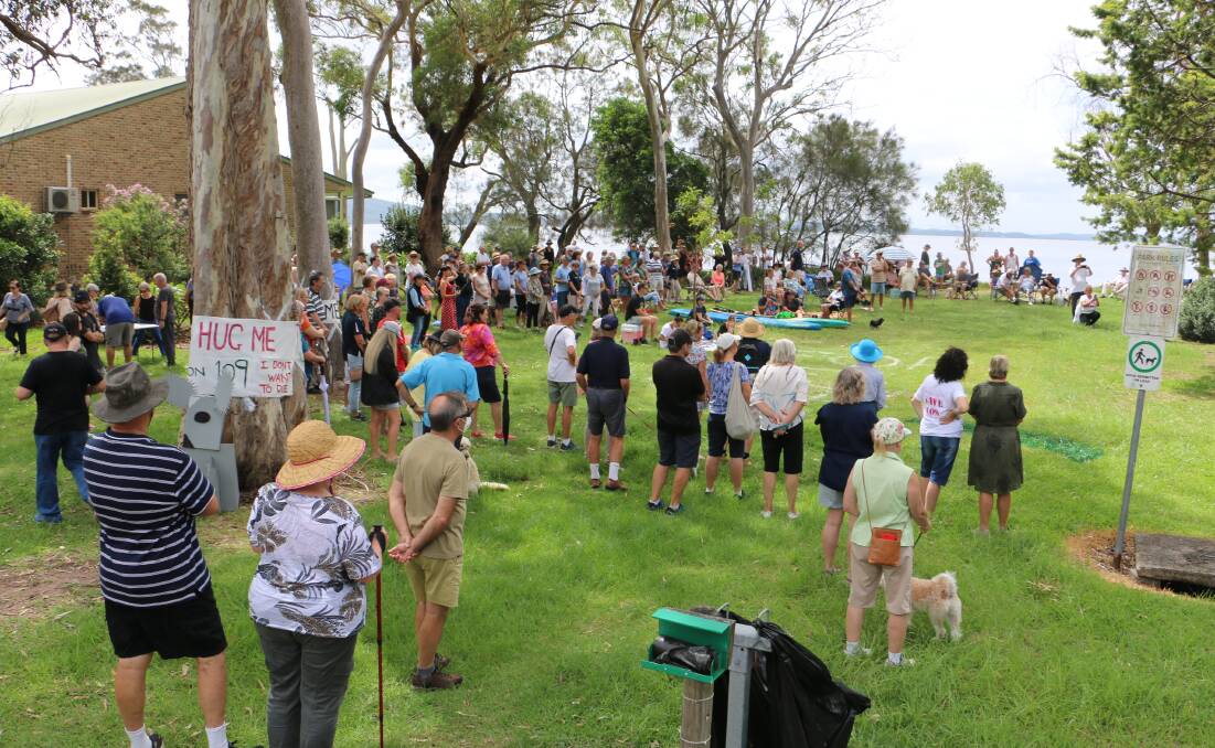 BIG CROWD: Some of the attendees at Sunday's rally to save 109 Foreshore Drive, Salamander Bay.