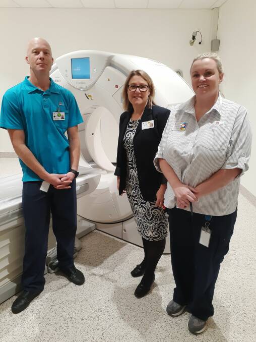 DELIVERY: Pictured with the new Tomaree CT scanner are (from left) senior radiographer Nick Marks, health services manager Belinda Ferguson and nurse unit manager Genevieve McLaren-Lee. Picture: Supplied