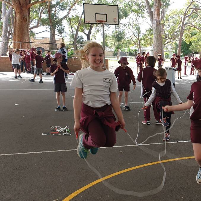 Students from Shoal Bay Public School jumping rope for charity.