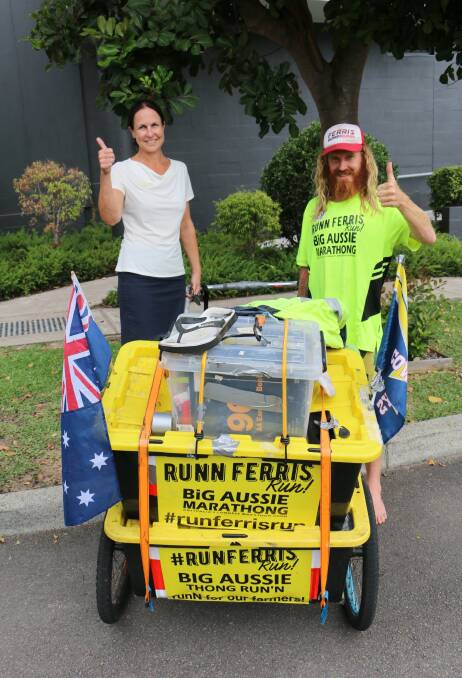 RUN FERRIS RUN: Ben Ferris gets the thumbs up on his day off from Mantra Aqua general manager Leanne Jenkins during his Nelson Bay stop over.