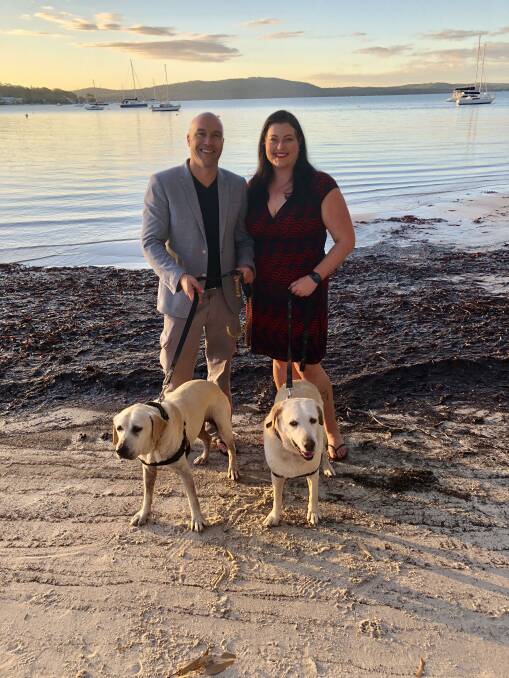 PRESELECTED: Jaimie Abbott with partner Matt Bailey and the couple's pet dogs, Charlize and Mika.