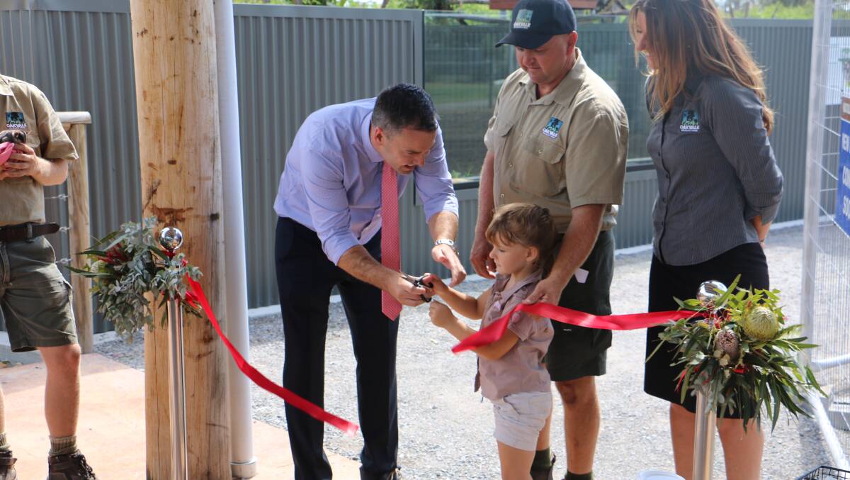 Mayor Palmer and Georgia Sansom, 4, cut the ribbon to officially open the sanctuary watched by Kent and Leanne Sansom.