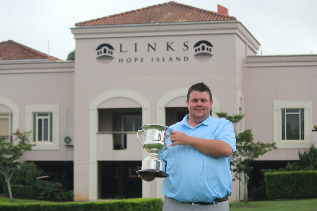 WINNER: Pacific Dunes golf pro Jamie Hook lifts the Queensland PGA trophy at the Links Hope Island course after his late-entry victory. Picture: Supplied