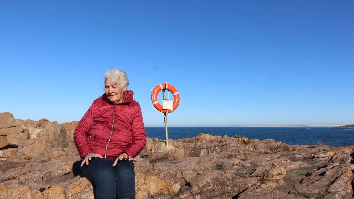 Boat Harbour's Marcia Smith. Behind her is an angel ring.