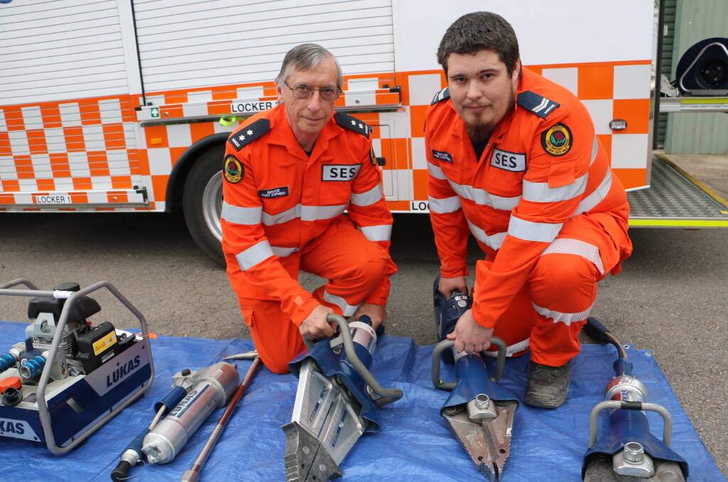 PREPARATION: Raymond Terrace SES deputy unit commander Bruce Gendre and volunteer Taylor Murray who will be supporting the simulated car crash scene.