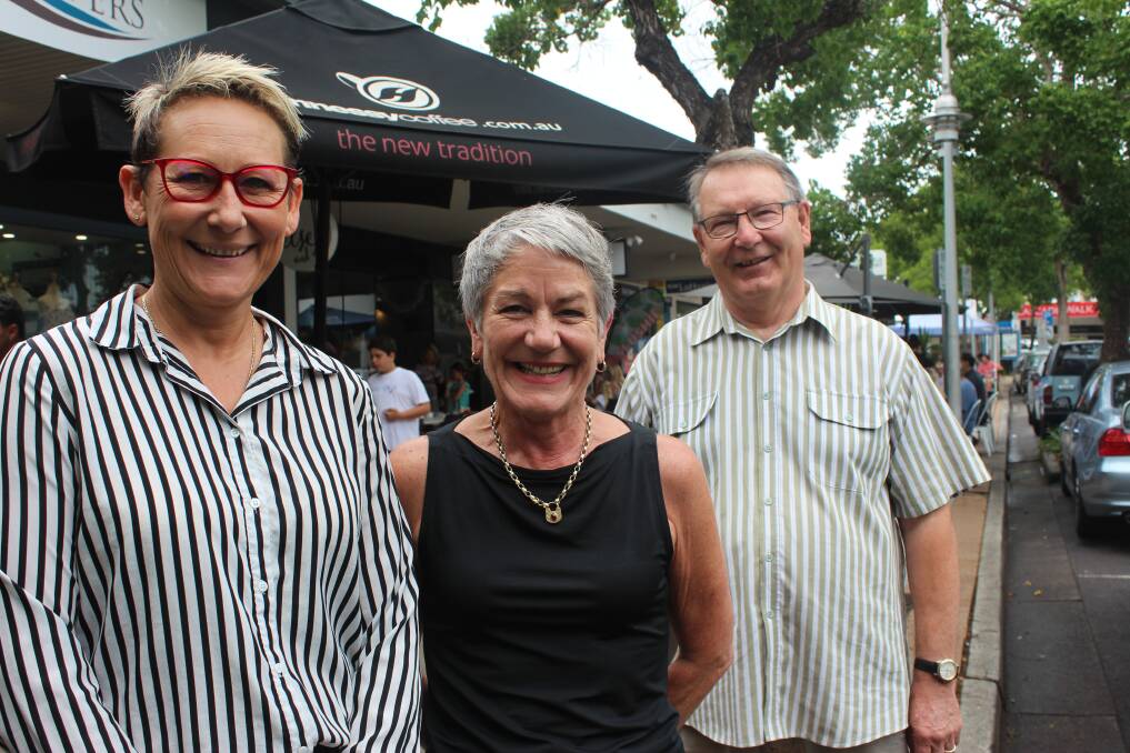ON THE GO: Tomaree Business Chamber president Leah Anderson, director Debra O'Neill and business development manager Peter Clough in a busy Nelson Bay town centre.