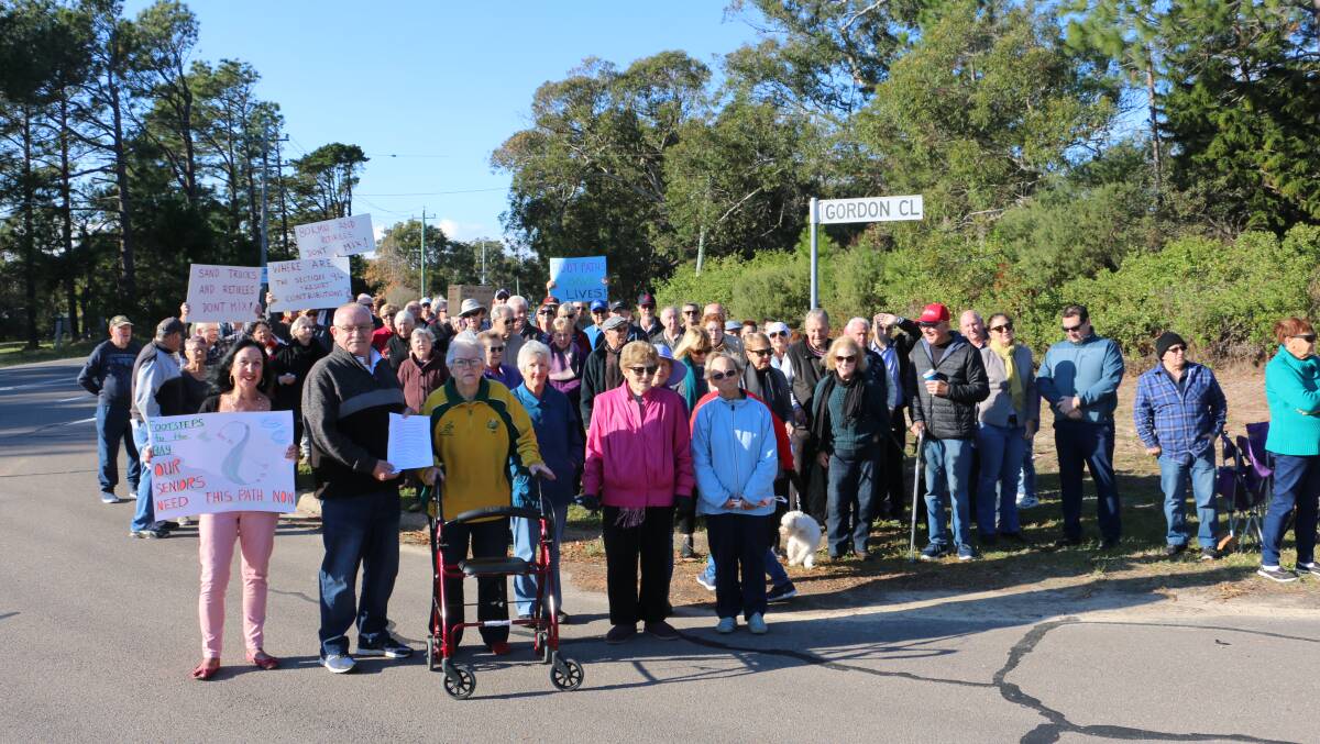 RALLY: Anna Bay residents turned up in droves to rally behind a call for Port Stephens Council to construct a footpath between Gordon Close and the shopping village.
