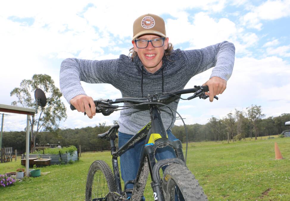 GOFUNDME: Medowie's Connor Lynch, 16, who will be going to Boston for eye surgery, enjoying time on his mountain bike.