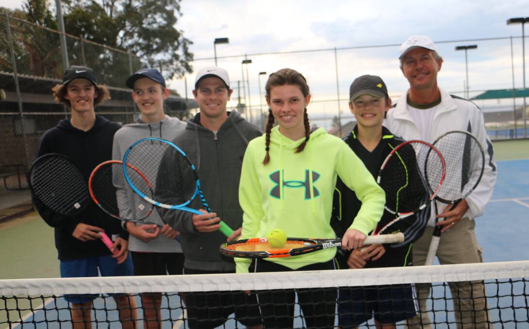 ANYONE FOR TENNIS?: Zac Watson 17, Harley Watson 15, Nelson Bay Tennis Club coach Blake Denison, Jessica West, 16, Lachlan Stubbs, 13, and club president Rod Stubbs.
