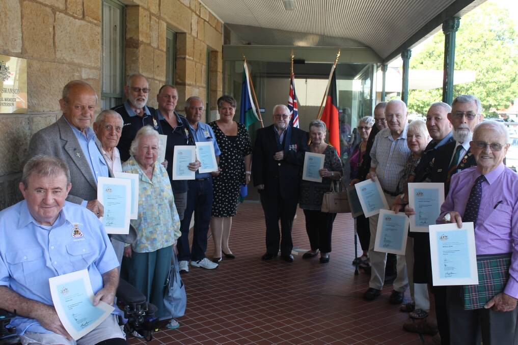 RECOGNISED: Paterson MP Meryl Swanson with the electorate's certificate of Appreciation recipients. Picture: supplied