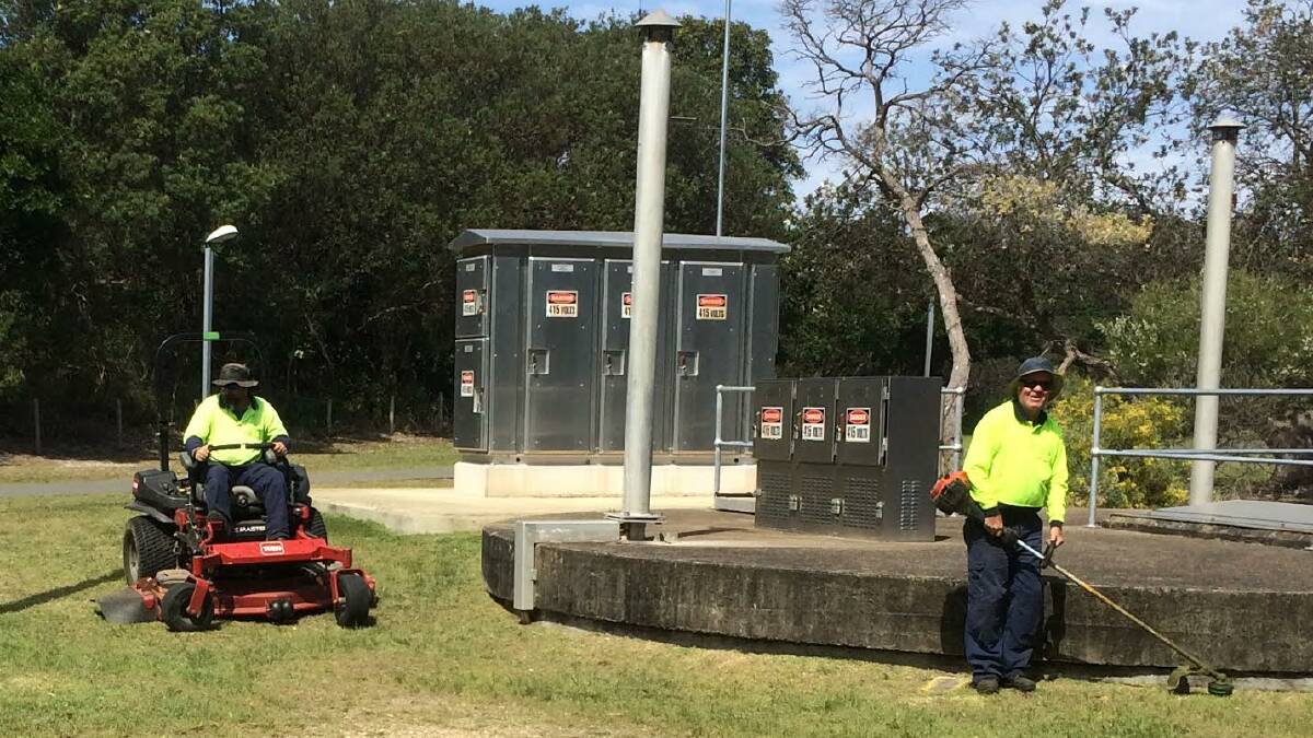 MAINTENANCE: Workers maintaining a Hunter Water site in Port Stephens. Picture: Supplied