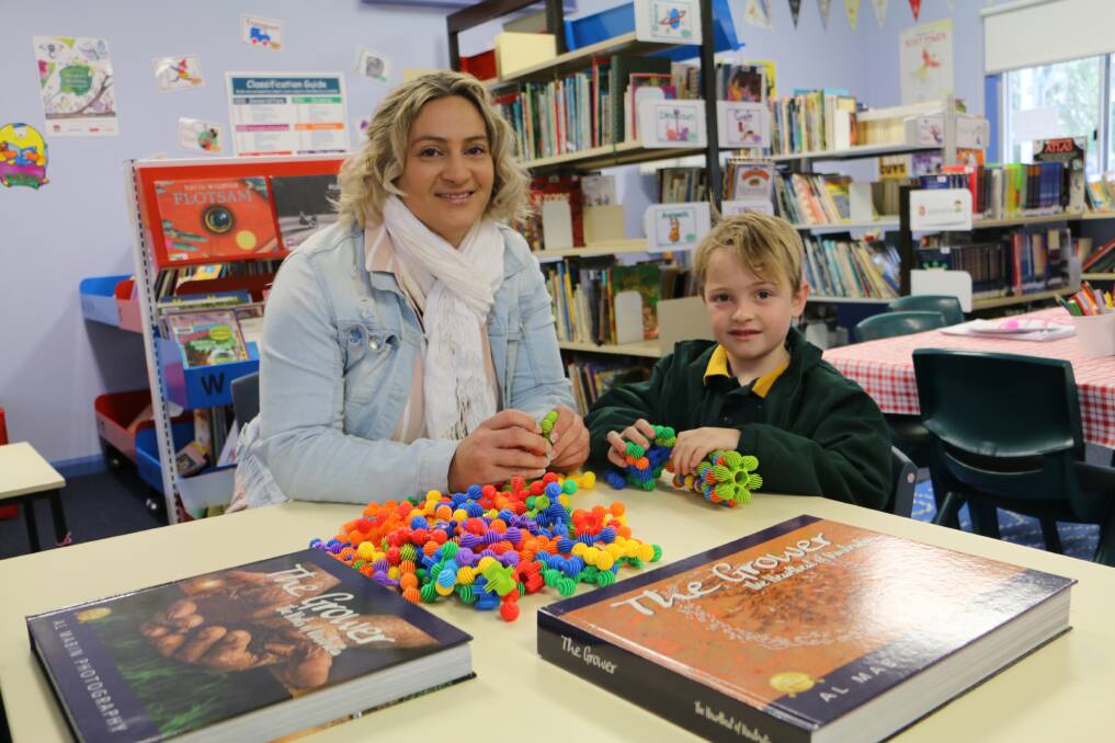 OOSH: Fern Bay mother Rachel Boller with her son, Charley, 6, a Year 1 student at Fern Bay Public, take advantage of the newly opened before school care service.