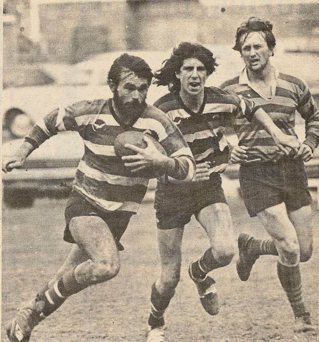 IN ACTION: "When I could run." Nelson Bay's John Clarke with ball with Allan Stocks in support. Picture: Supplied