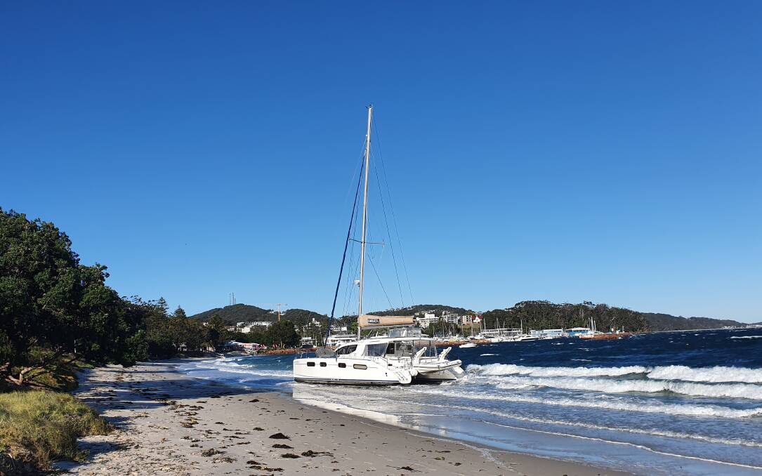 AGROUND: The Pacifica, owned by a visiting Sydney couple, which ran aground at Nelson Bay Beach on September 25 after the moorings had broken. Picture: Supplied