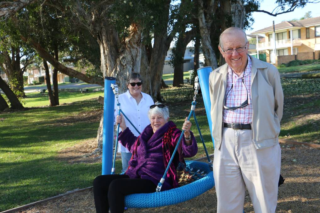 FUNDING SUCCESS: Fran Corner (seated) with fellow Tilligerry Community Association members Jan James and Bay Marshall at Peace Park in Tanilba Bay.