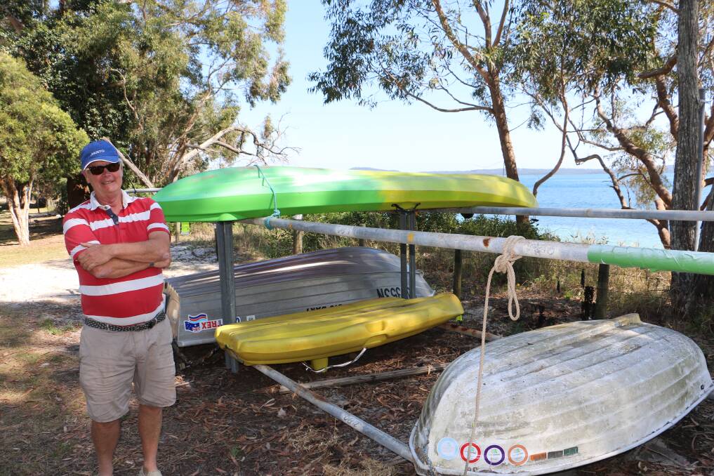 COMMON SENSE: Nelson Bay's John Corrie at the Dutchies Beach dinghy rack which could in future legally carry kayaks and canoes as well as dinghies.