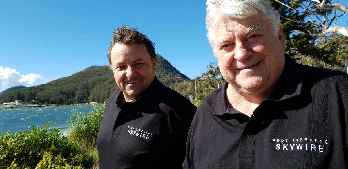 Two of the brains behind the Skywire are Paul Tyszyk and Michael Mace, pictured in front of the Tomaree Headland. Picture: Supplied