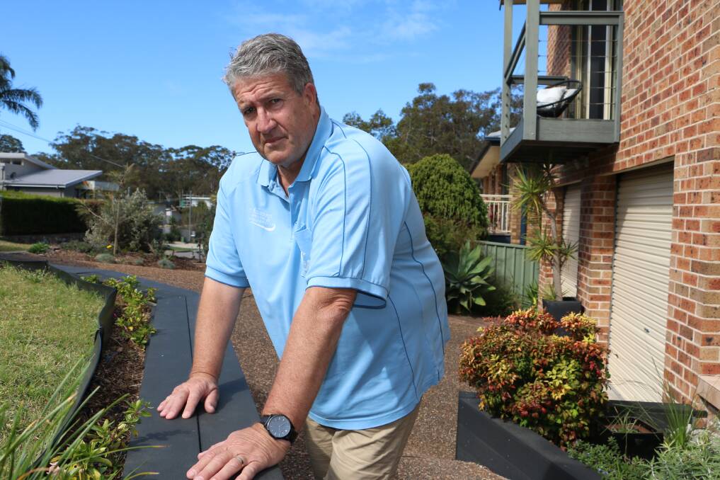 BAD BACK: Transport officer Mick Bradley, at his Nelson Bay home, says he welcomes the government backdown on the age pension.
