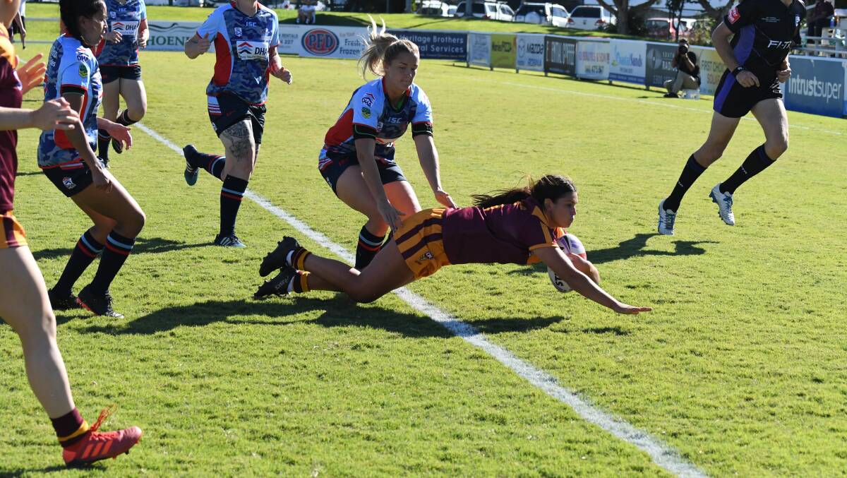 TRY TIME: Bobbi Law goes in for one of three tries playing for NSW country in the national women's rugby league championships in Queensland. Picture: Country Rugby League