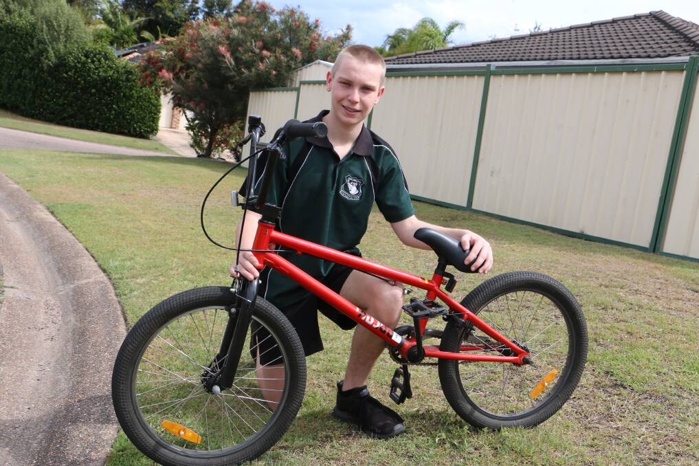 CYCLIST: Kolby Mason, 16, from Raymond Terrace, with some school friends is helping to raise money for the rescue helicopter service.
