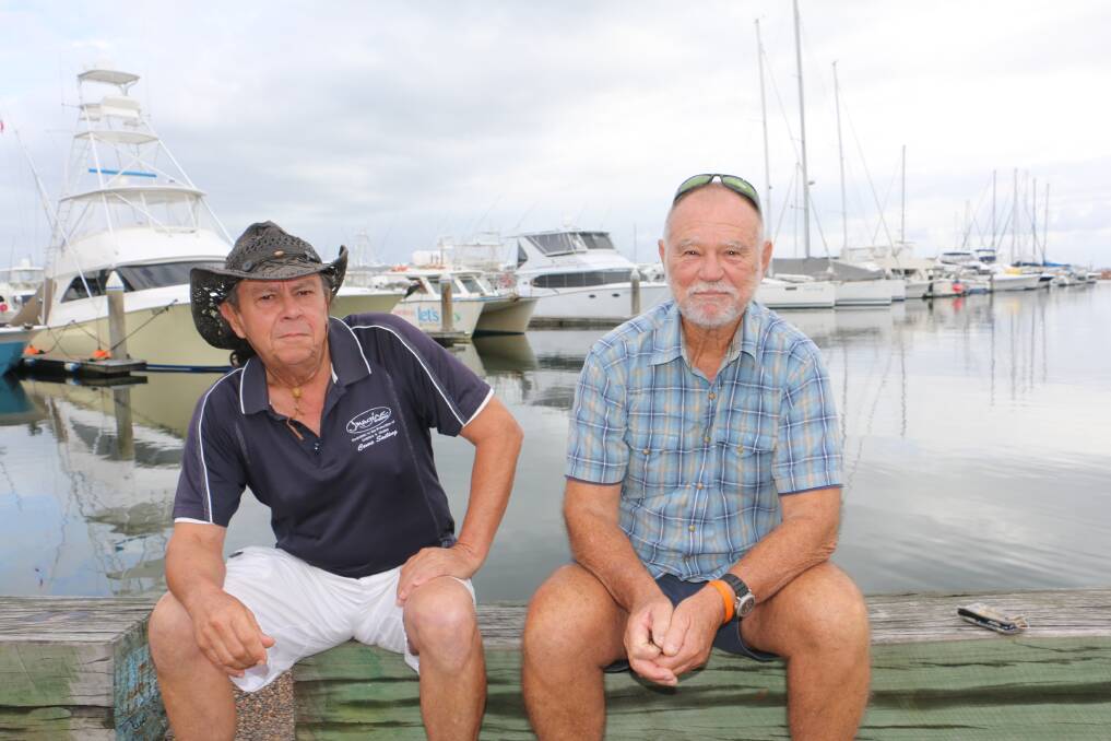 UNITED: Two of the Port's most repsected lobbyists Frank Future (left) and John Clarke ponder the merits of the great jet ski debate in Nelson Bay.