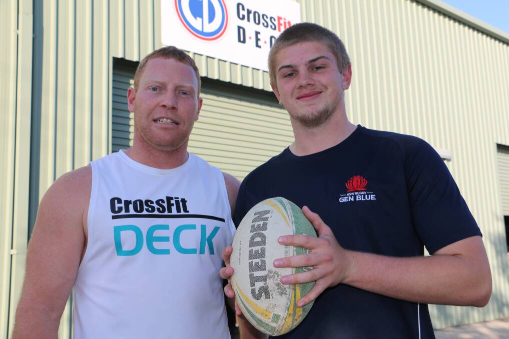 SELECTION: Raymond Terrace rugby representative Logan Badger, aged 15, (right) with CrossFit trainer Mitchell Cox.