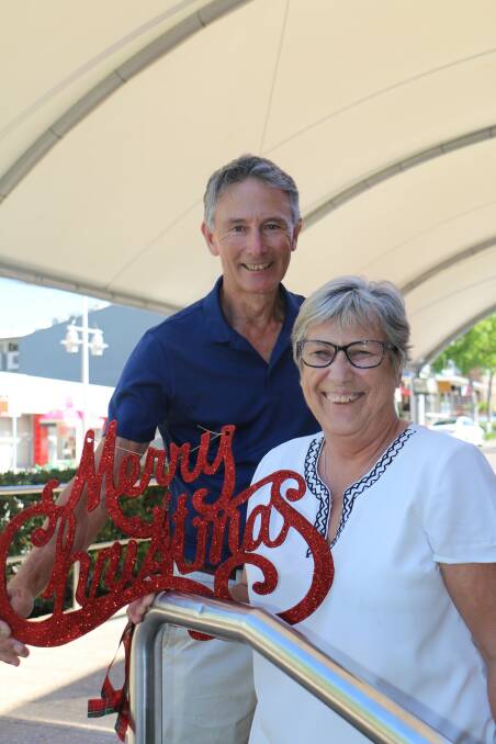 FESTIVITY: Nelson Bay businessman and Civic Pride member Rory Milne with chamber volunteer Teresa Hillery at the Stockton Street stage.