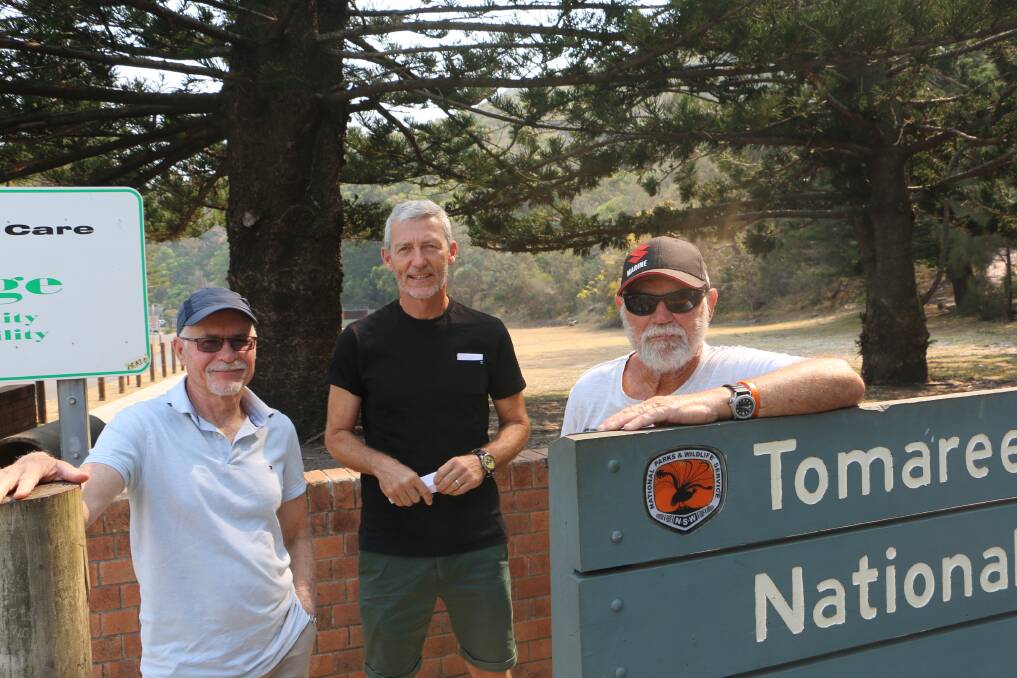 ON THE GO: Tomaree Museum Association committee members (from left) Chris Peters, Ian Farnsworth and John Clarke in front of the Tomaree Lodge site in Shoal Bay.