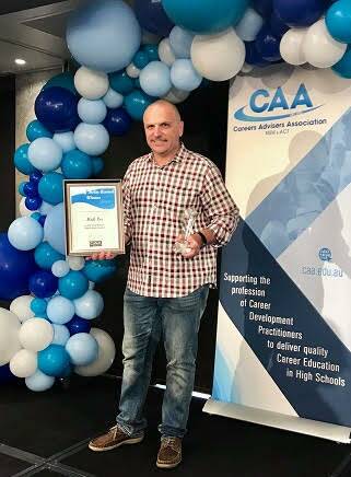 AWARDED: Hunter River High careers adviser Mick Lee with his certificate. Picture: Submitted