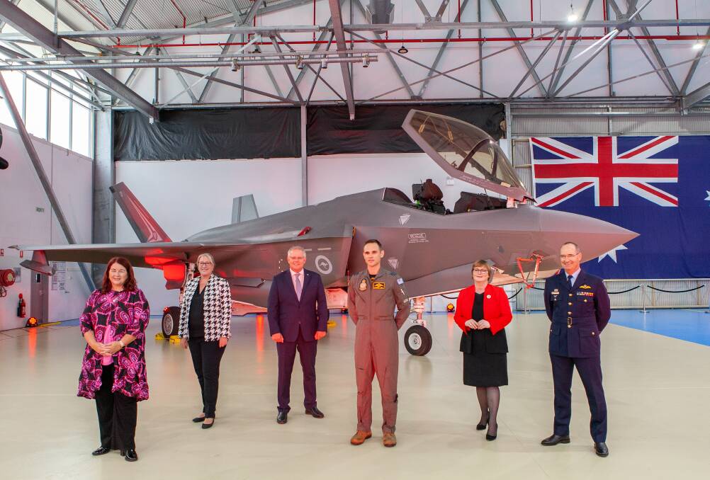 WELCOME MAT: Prime Minister Scott Morrison with his parliamentary entourage and Chief of Air Force Air Marshal Mel Hupfeld (right). Picture: Supplied