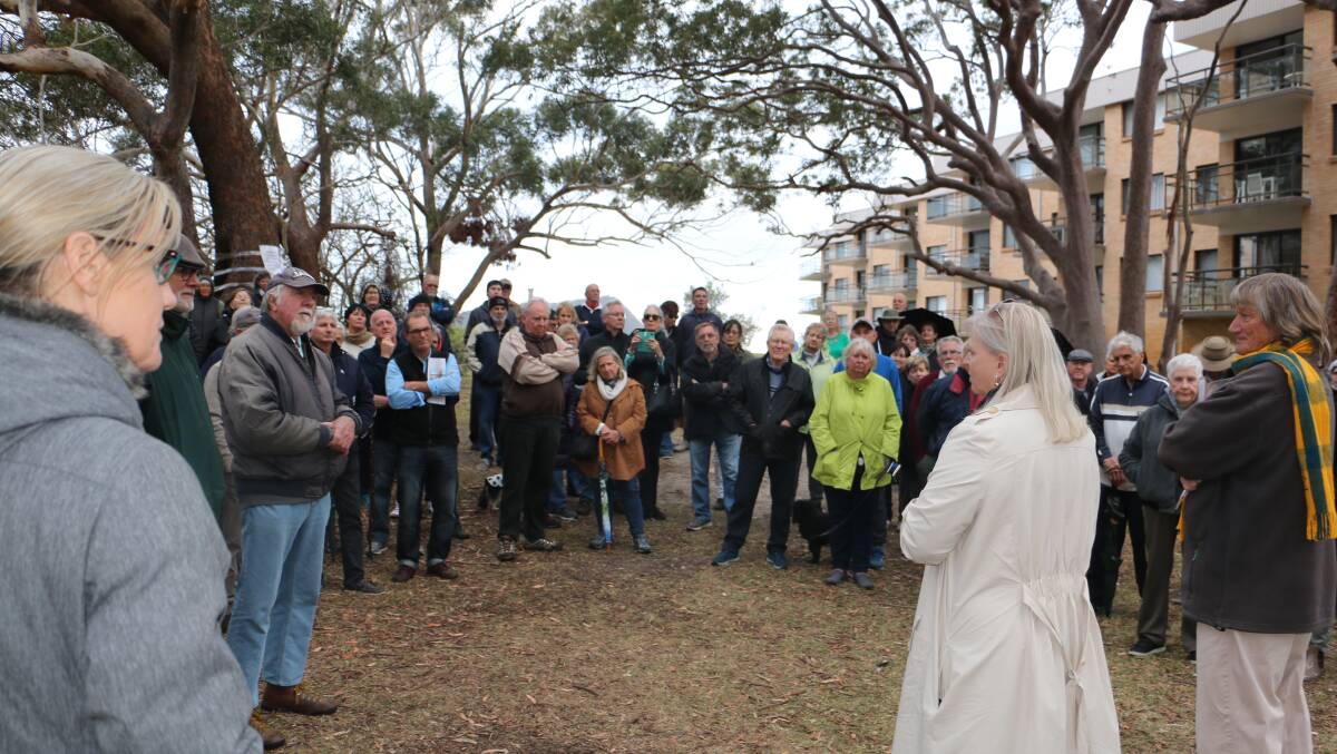MEETING: Port Stephens Council's corporate services manager  Carmel Foster addresses the crowd at Shoal Bay's Halifax Park on Monday.