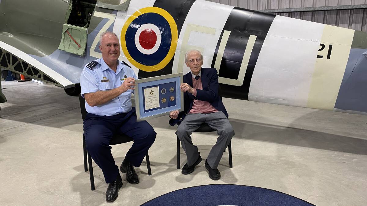 CENTENARIAN: Sid Handsaker with the Williamtown RAAF Base SADFO GPCAPT Anthony Stainton. Picture: Supplied