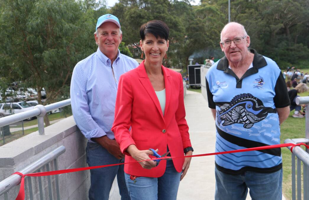 RIBBON-CUTTING: Port Stephens MP Kate Washington at the ribbon-cutting ceremony watched by Gropers president Gavin Rocher (left) and club patron Ray Milton.